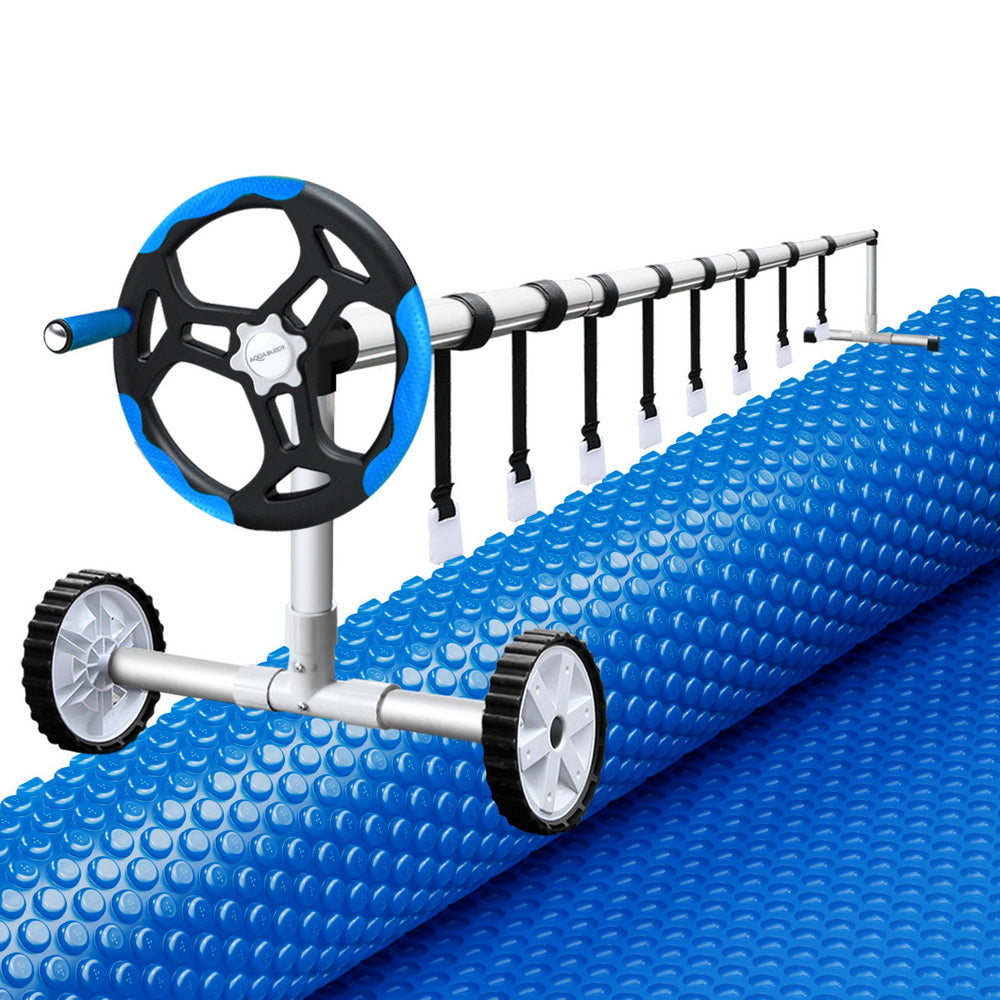 Blue solar pool cover with bubble surface and roller frame for unrolling