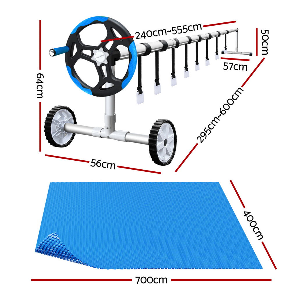 Blue solar pool cover with roller frame and rectangular cover panel