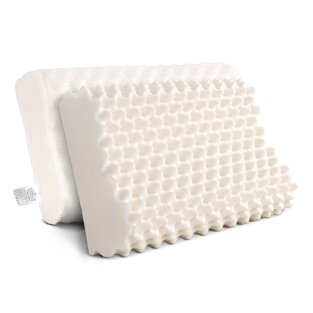 Natural latex pillow, creamy white, showing honeycomb latex core on the edge