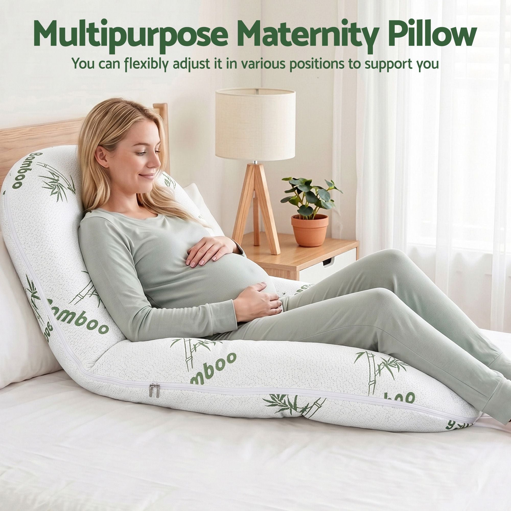 C-shaped maternity body pillow with white bamboo-fiber cover and green bamboo pattern