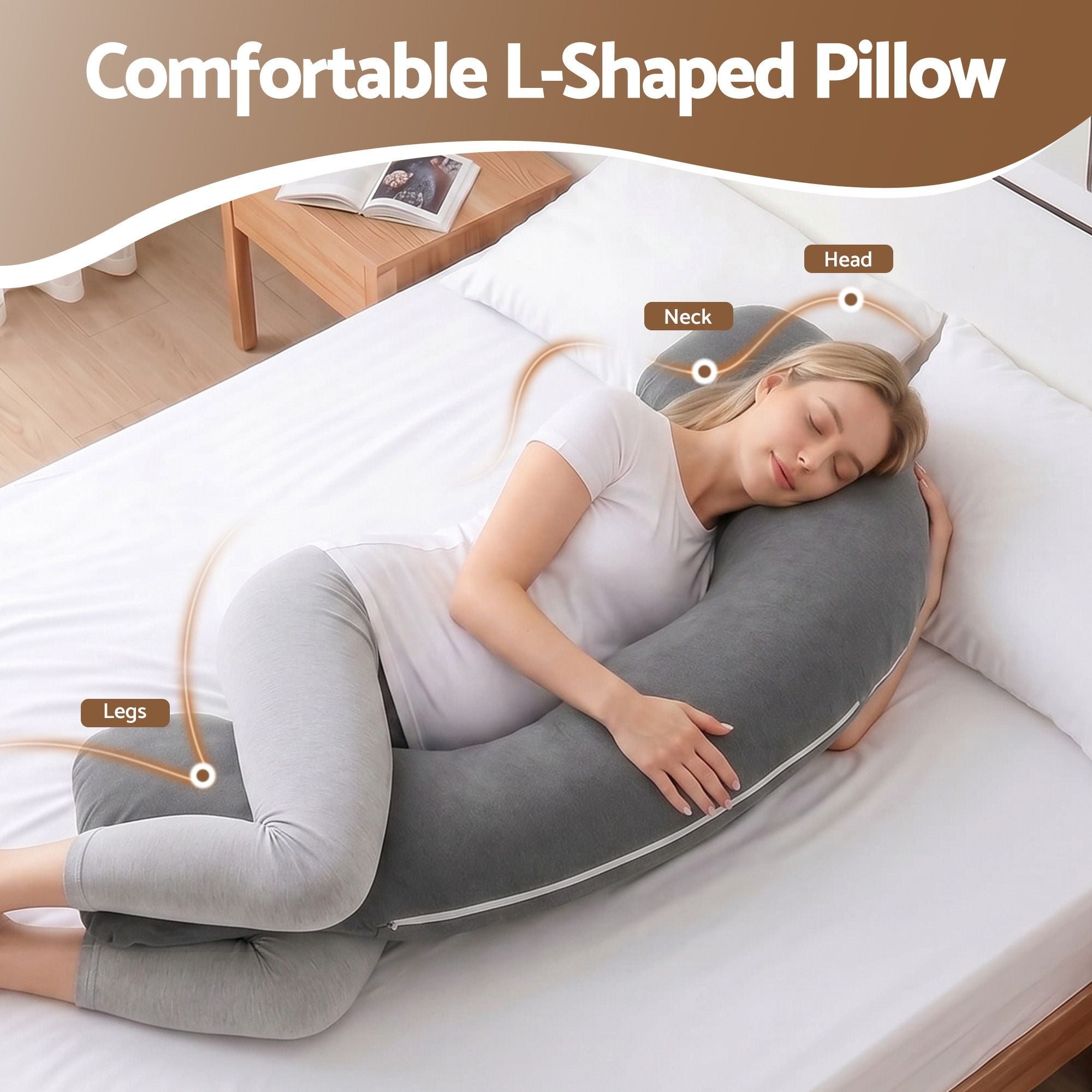 Grey L-shaped maternity body pillow for side sleeping, curved head and belly support.