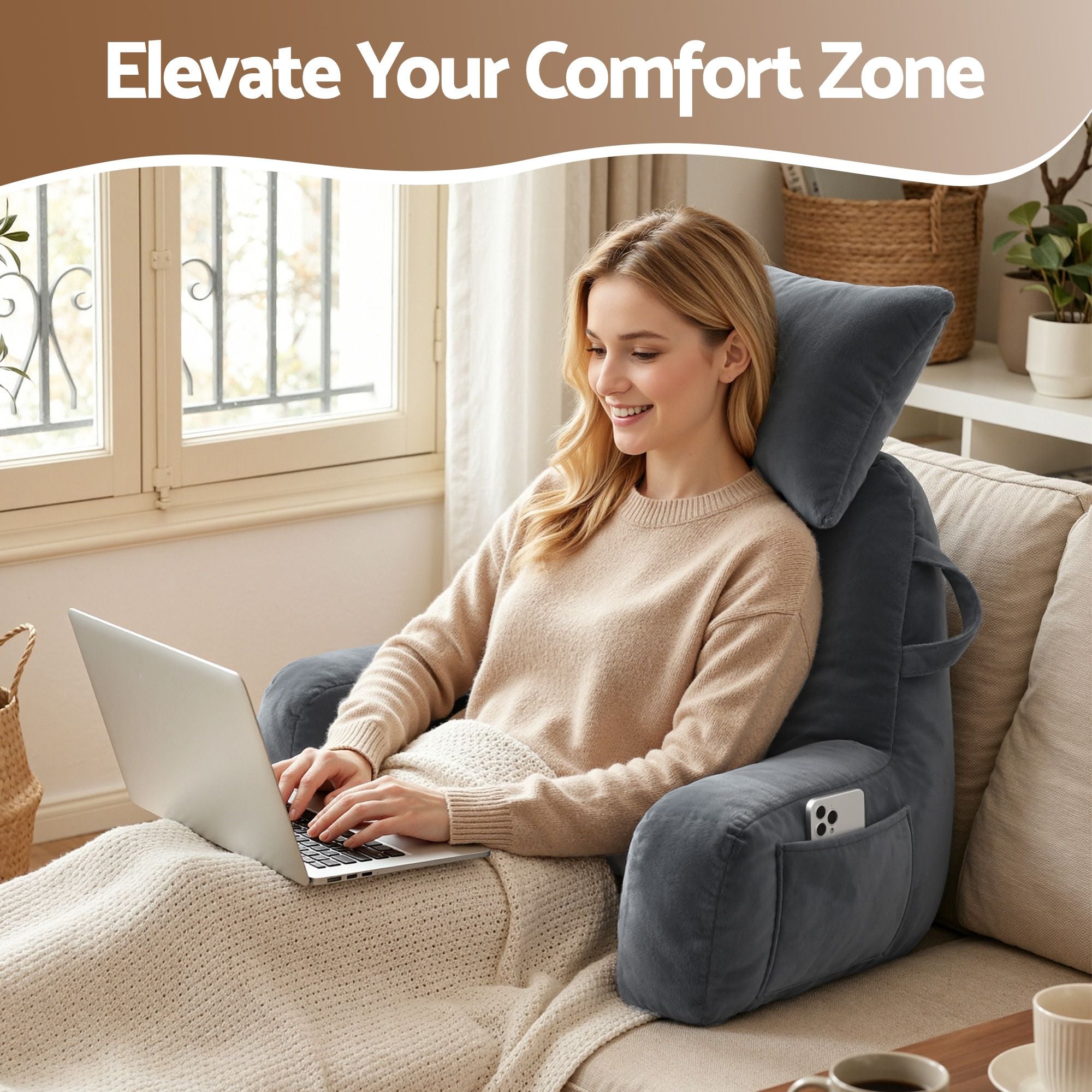 Gray back support pillow with neck roll and armrests for comfortable laptop use in bed