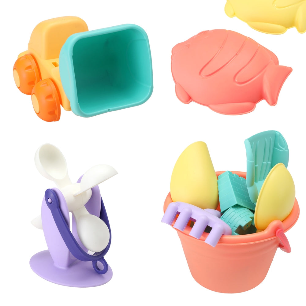 Kids sand play tool kit close-up of teal and orange buckets, windmill and shell molds