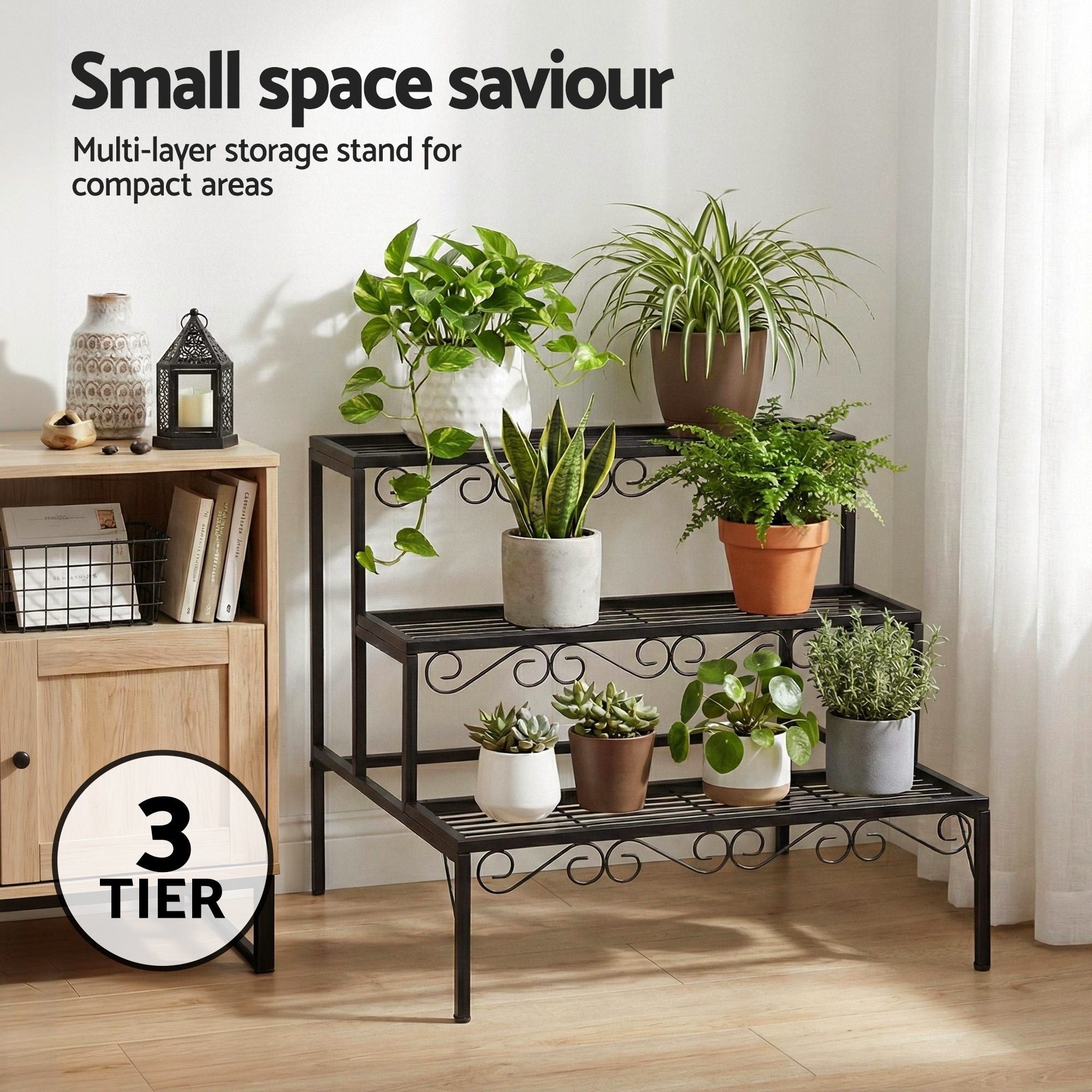 Black 3-tier metal plant stand with scrollwork, displaying multiple potted plants
