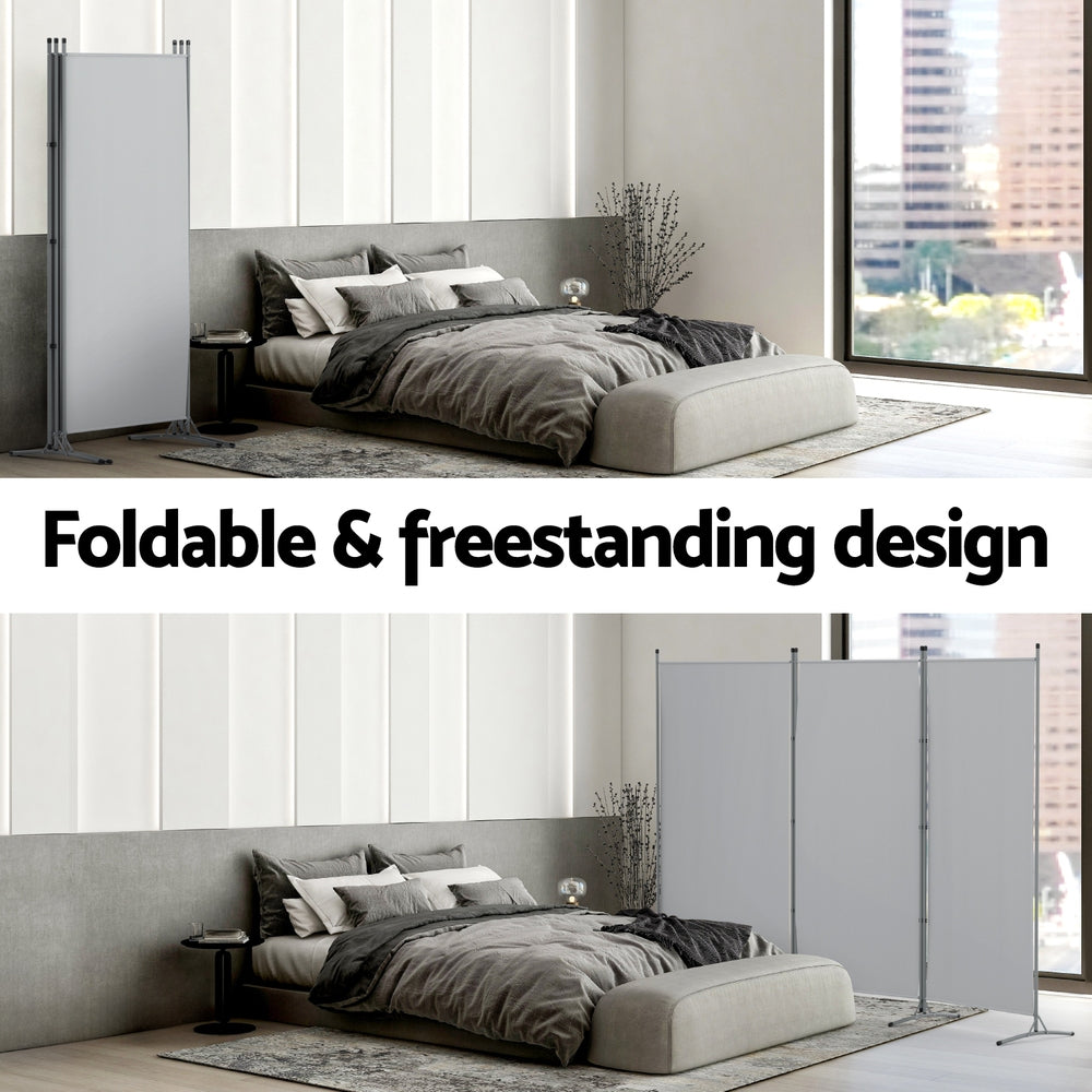 3-panel room divider screen with grey fabric panels and silver metal frame, placed beside bed