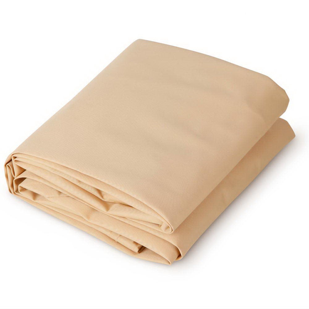 Sand rectangle shade sail, folded with stitched edges and layered fabric.