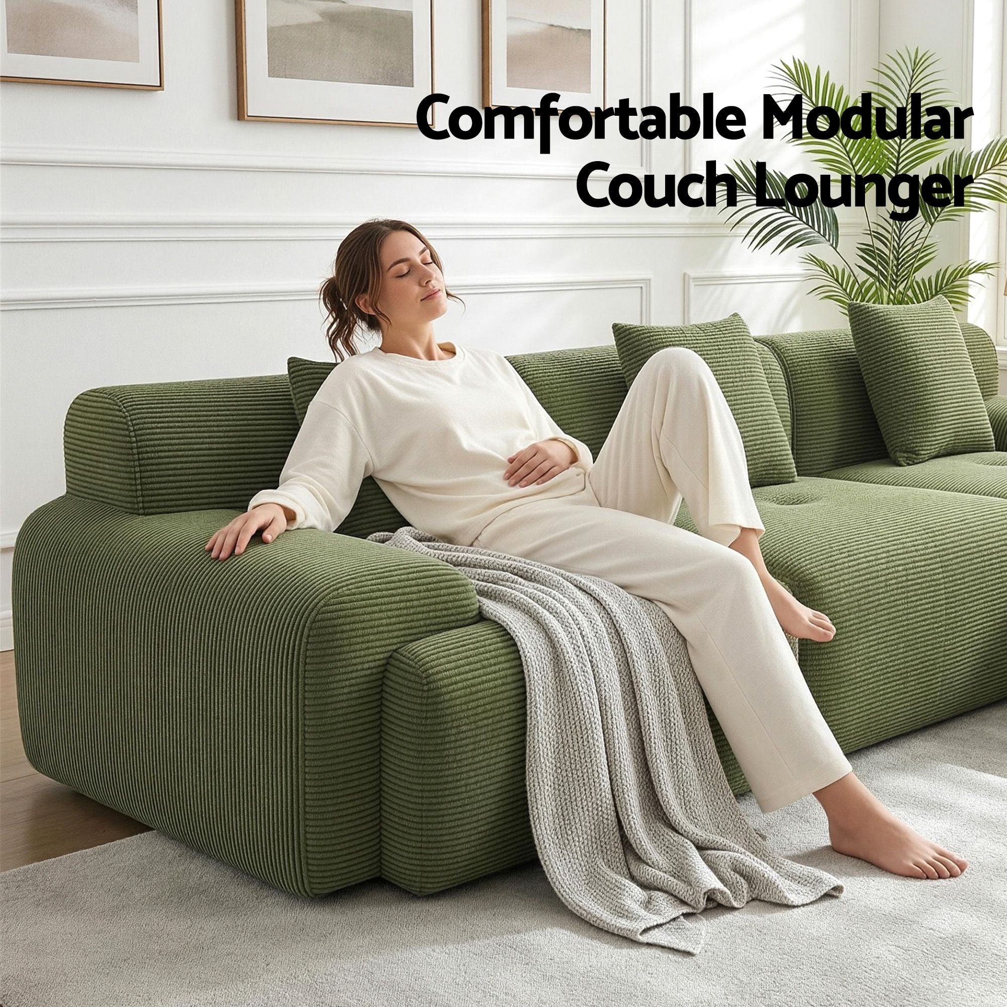 Green modular sectional sofa bed with deep chaise section and back pillows