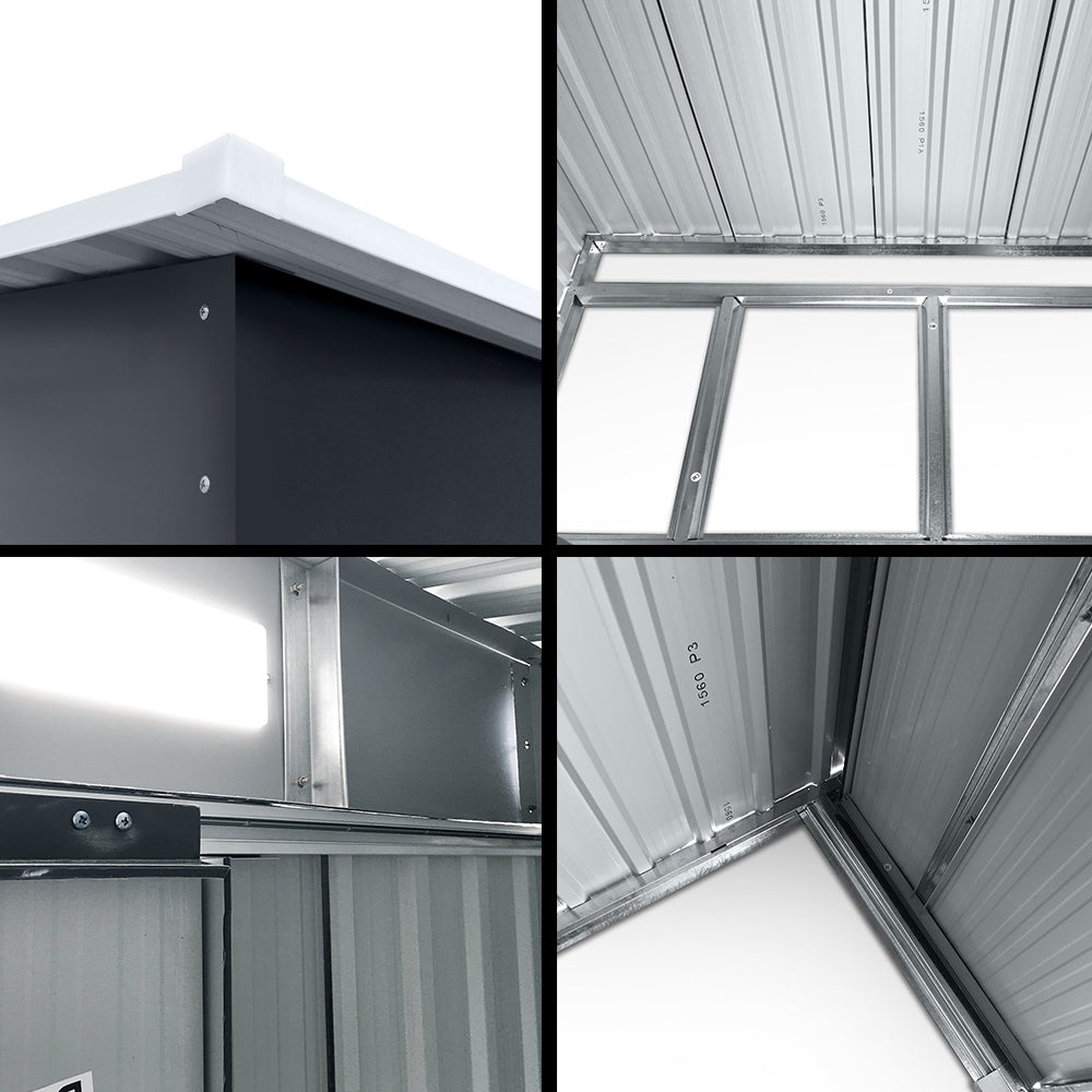 Metal shed interior showing gray base floor and steel support frame with beams