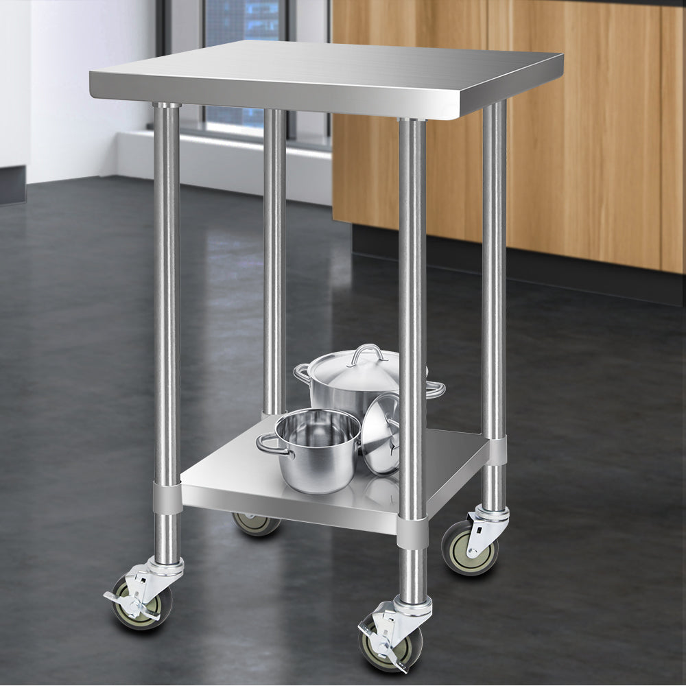 Stainless steel kitchen bench cart with two-tier shelves and caster wheels, angled view