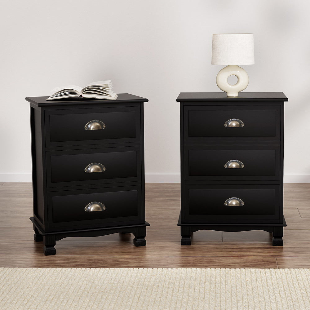 Pair of black bedside tables with three drawers each and arched metal handles