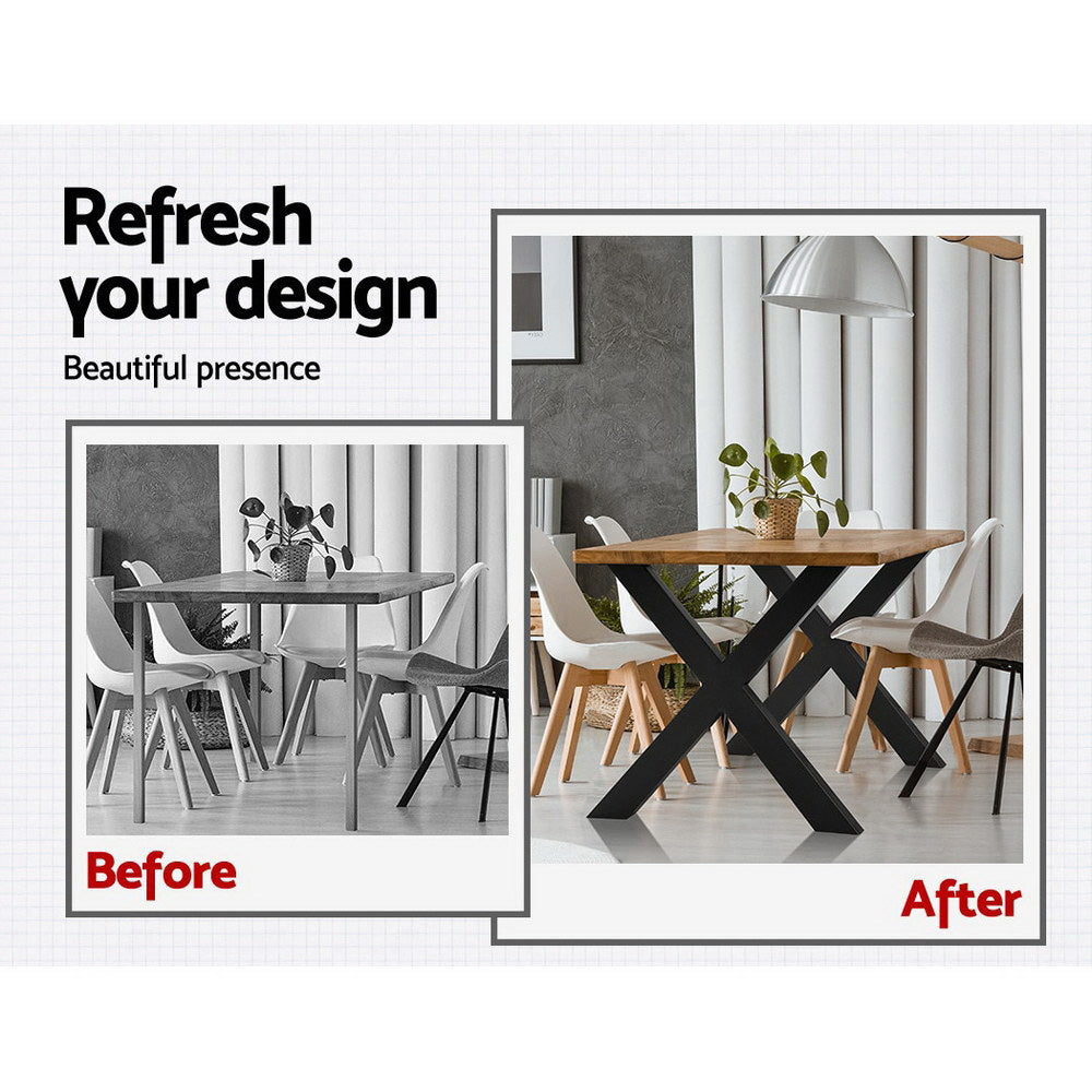 Black X-frame metal table legs supporting a dining table.