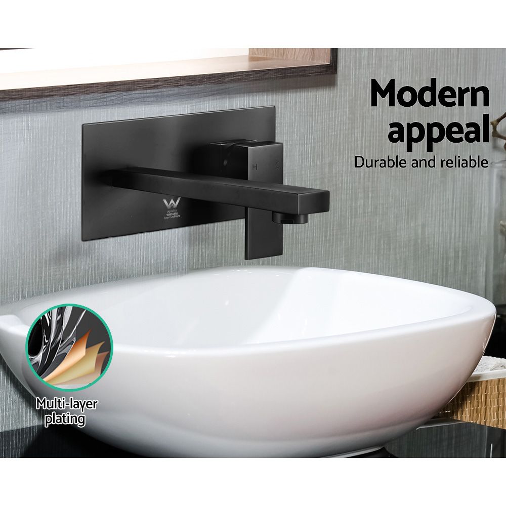 Black wall-mount basin mixer tap over a white sink, with single lever control