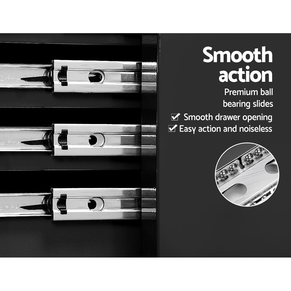 Close-up of metal drawer rails and smooth sliding mechanisms on tool cabinet