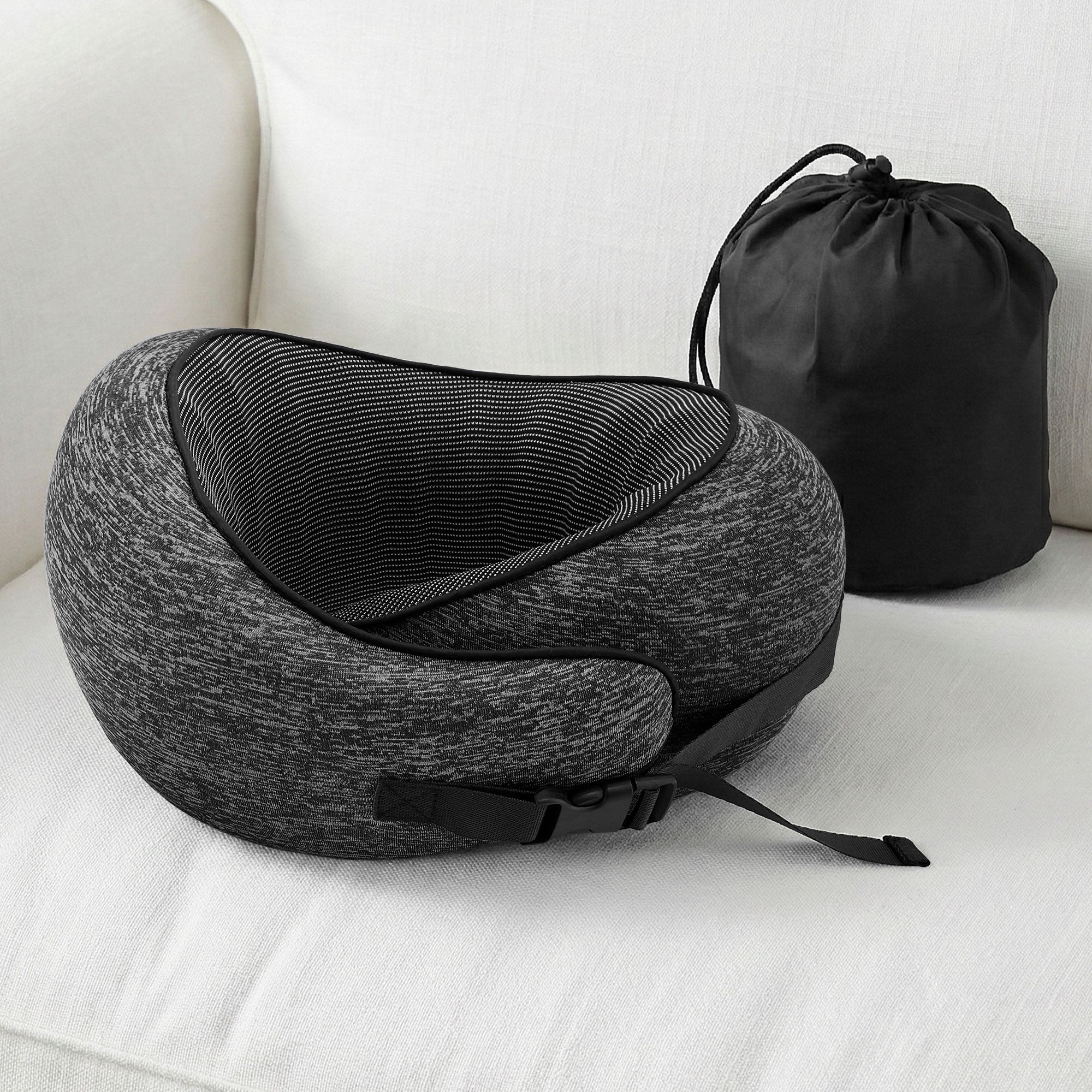 Dark grey travel neck pillow with matching drawstring storage bag