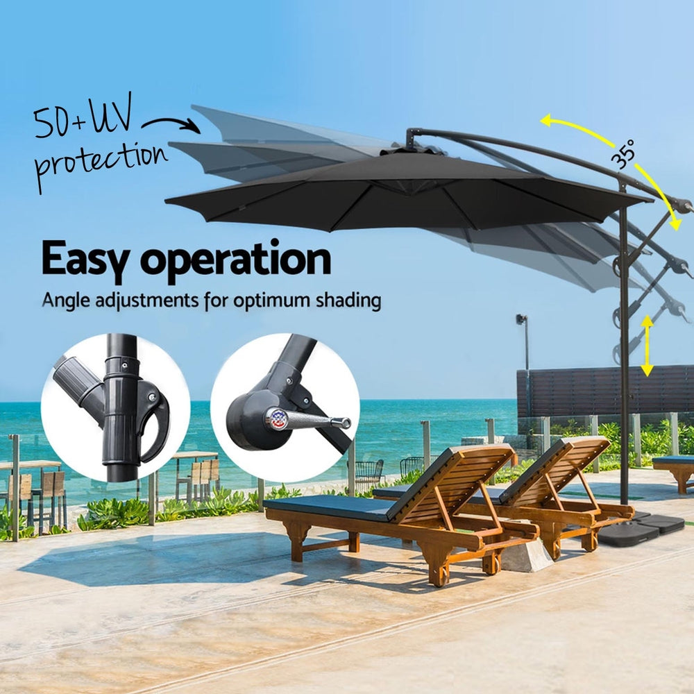 Black cantilever patio umbrella with adjustable tilt and open canopy