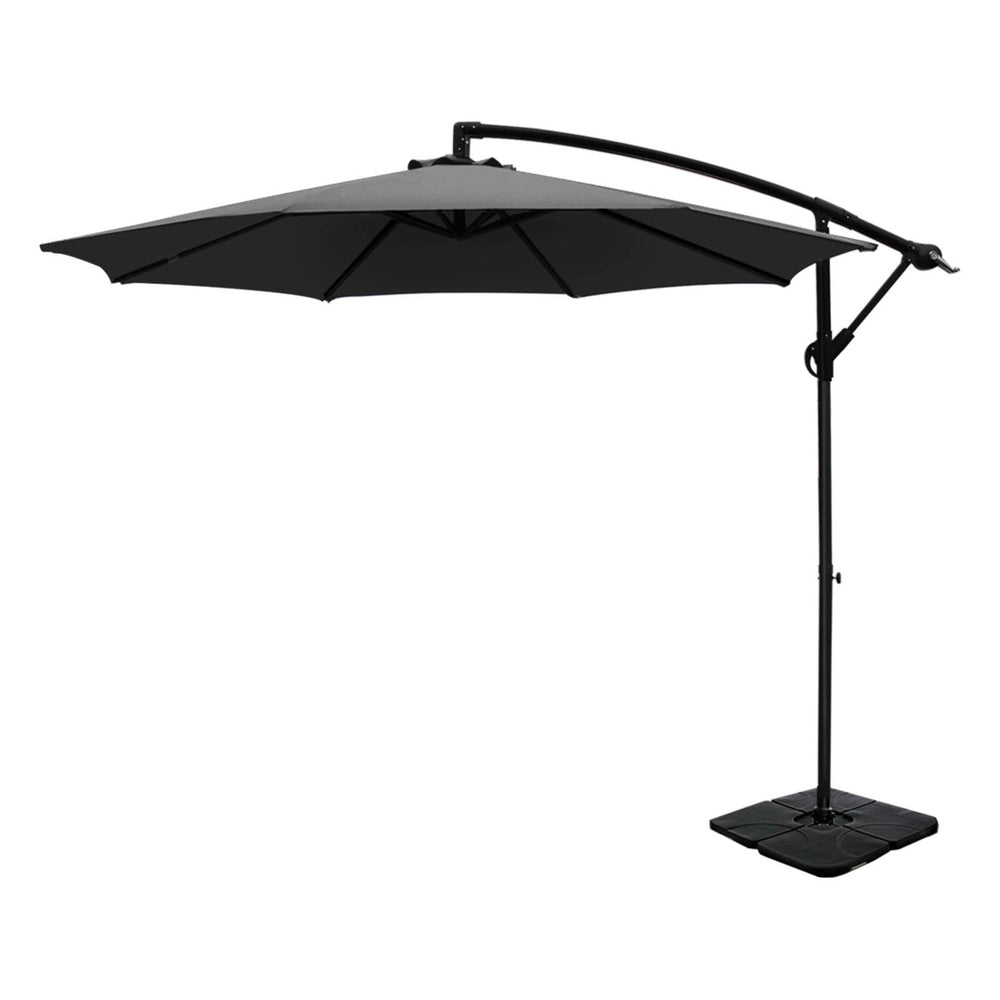 Charcoal cantilever patio umbrella with rectangular base and cross-arch frame