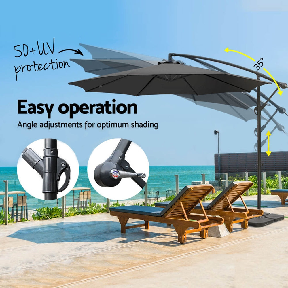 Charcoal cantilever patio umbrella with fabric canopy, angled for side shade