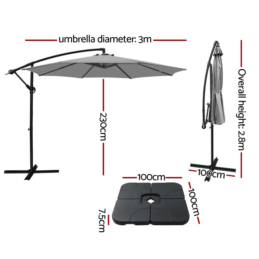 Grey 3m cantilever umbrella with central hub and cross-shaped weighted base
