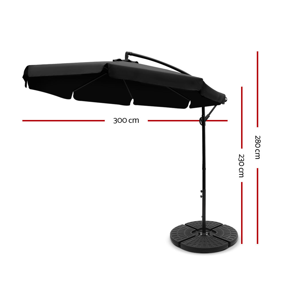 Black cantilever patio umbrella with extended canopy and round base