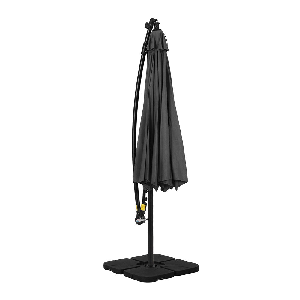Charcoal cantilever patio umbrella with hanging cover and four-part base