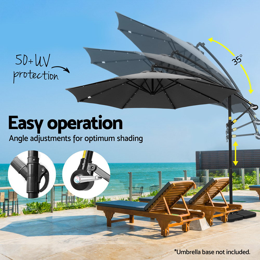 Cantilever patio umbrella with black canopy and adjustable tilt arm
