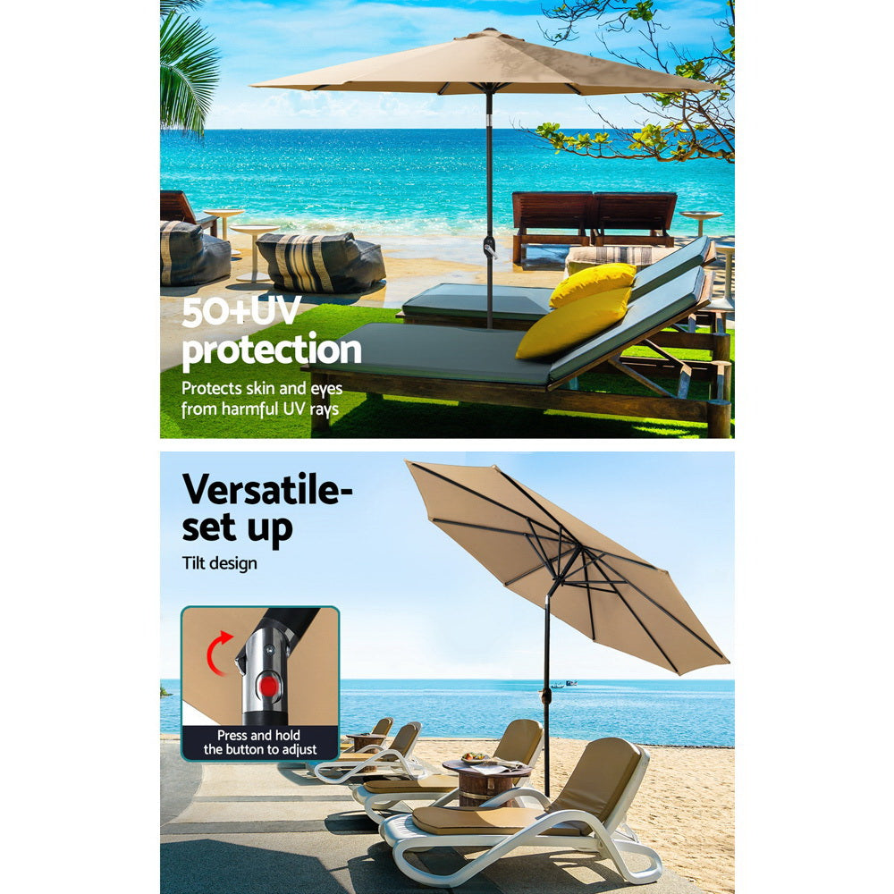 Beige outdoor umbrella with open canopy and central black pole above seating