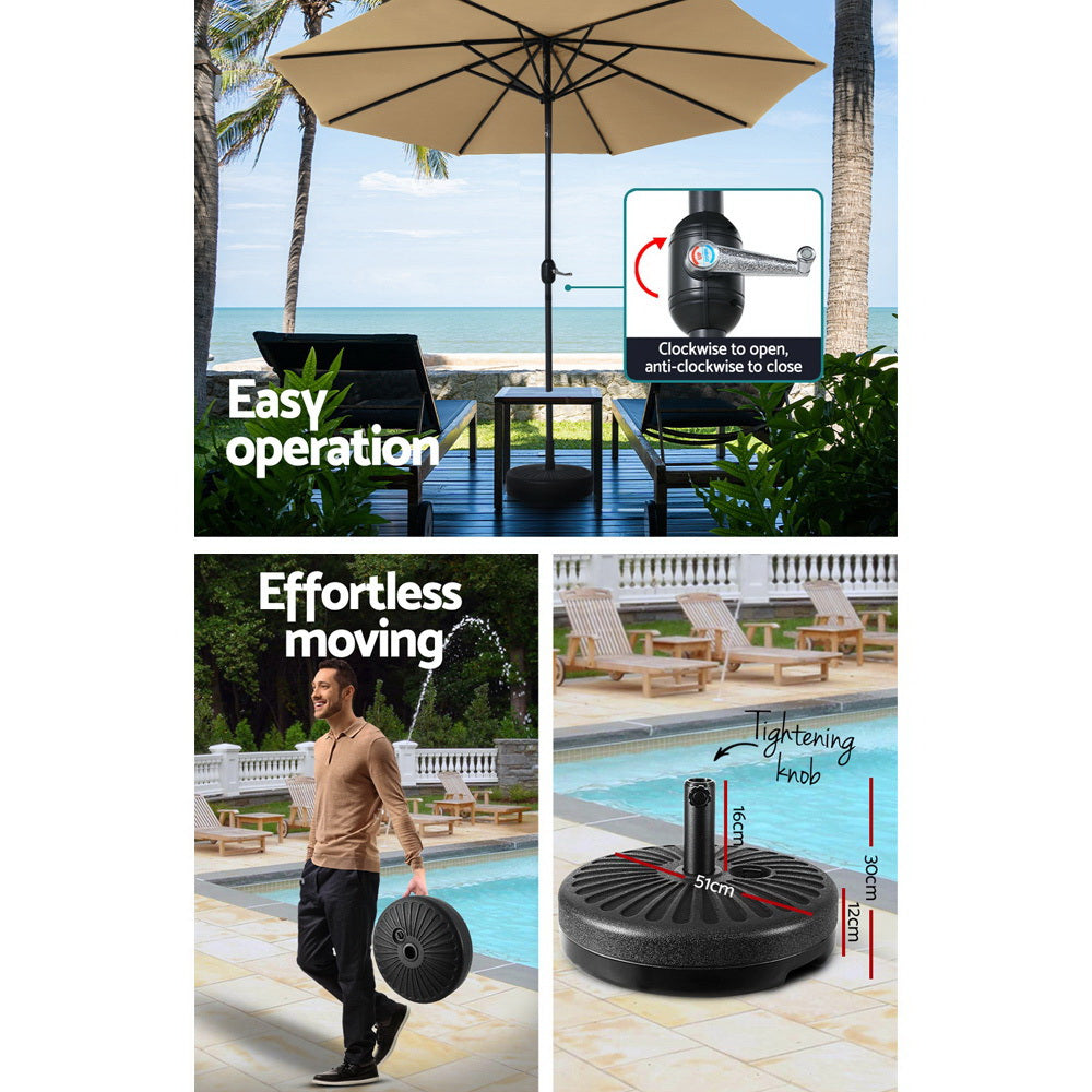 Beige patio umbrella with open canopy, black pole, and round base
