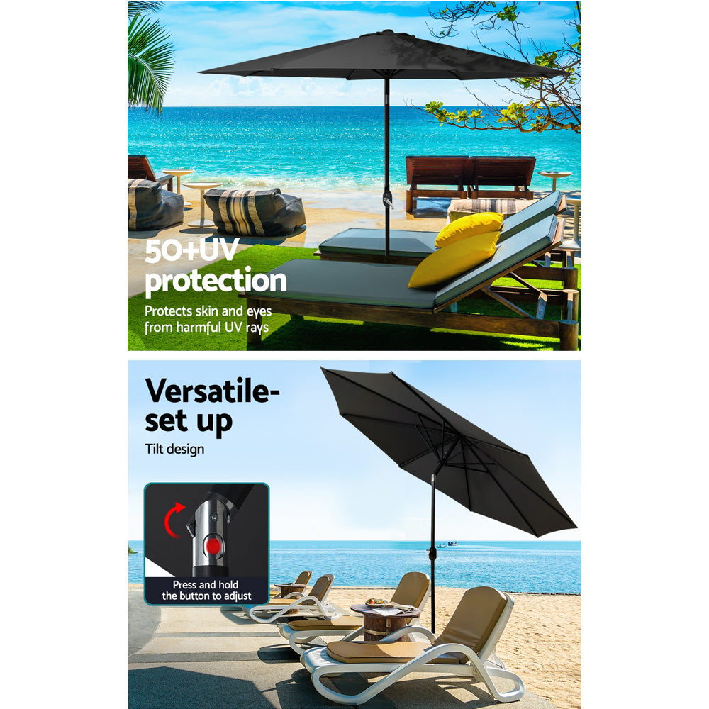 Black outdoor umbrella over patio seating set with tilt canopy