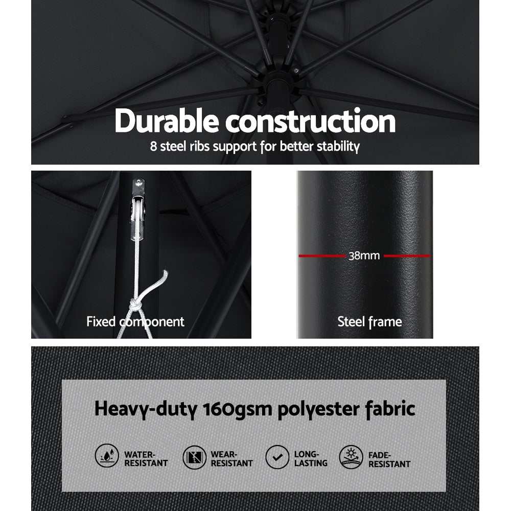 Black umbrella canopy construction with metal frame ribs and dark fabric