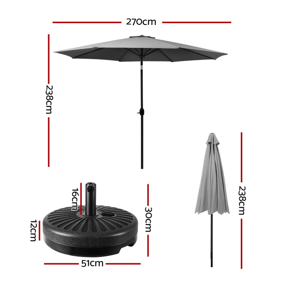 Outdoor umbrella with open canopy, round weighted base, and storage cover