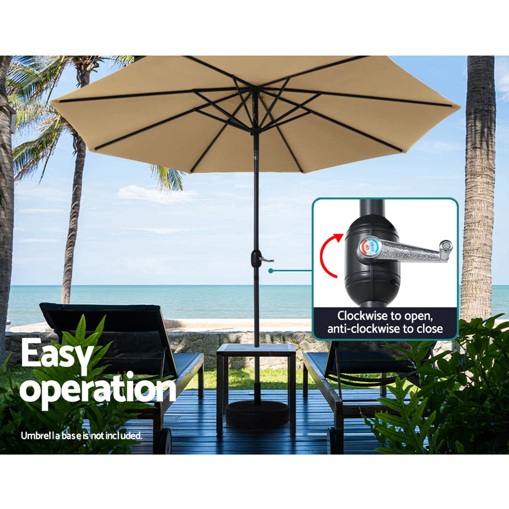 Outdoor umbrella pole with beige canopy and easy-open crank control