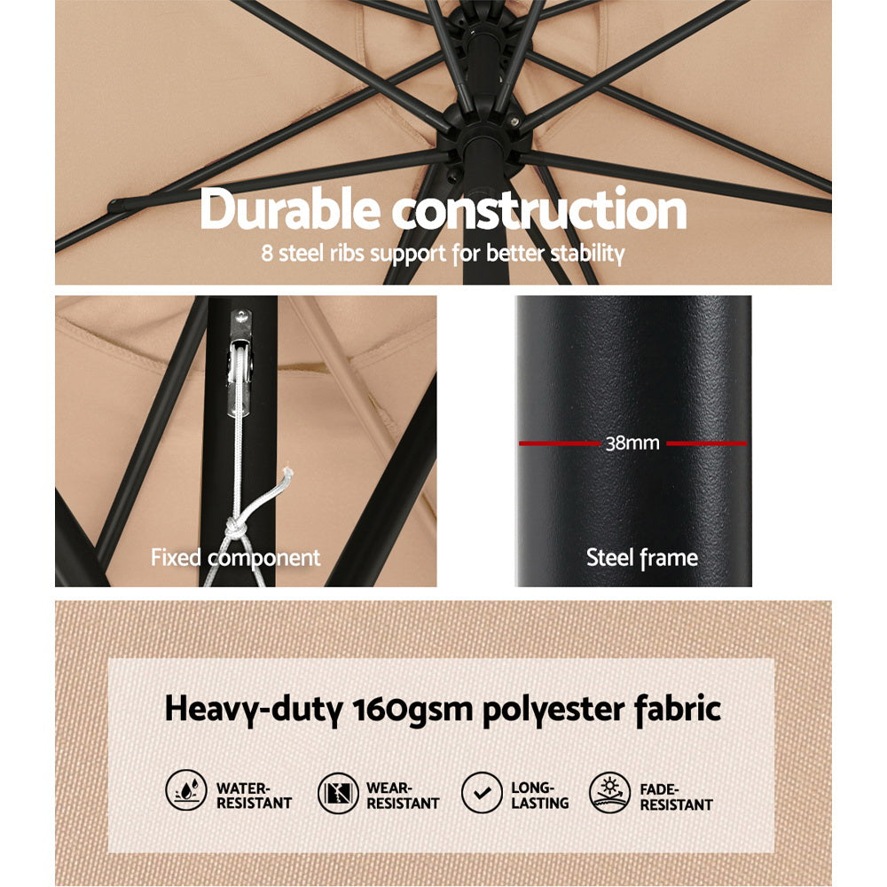 Beige umbrella canopy with steel ribs and black center pole