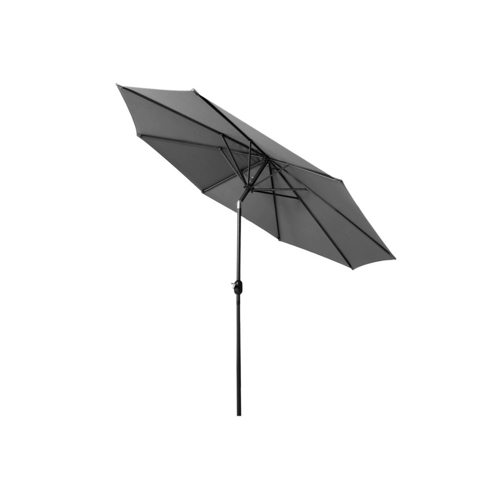 Charcoal outdoor tilt umbrella with angled open canopy and central black pole