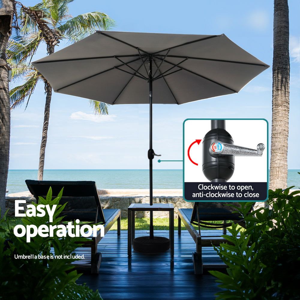 Charcoal outdoor tilt umbrella with open canopy and central black pole