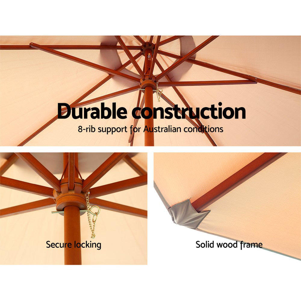 Beige umbrella canopy with wooden frame ribs and hanging support chain