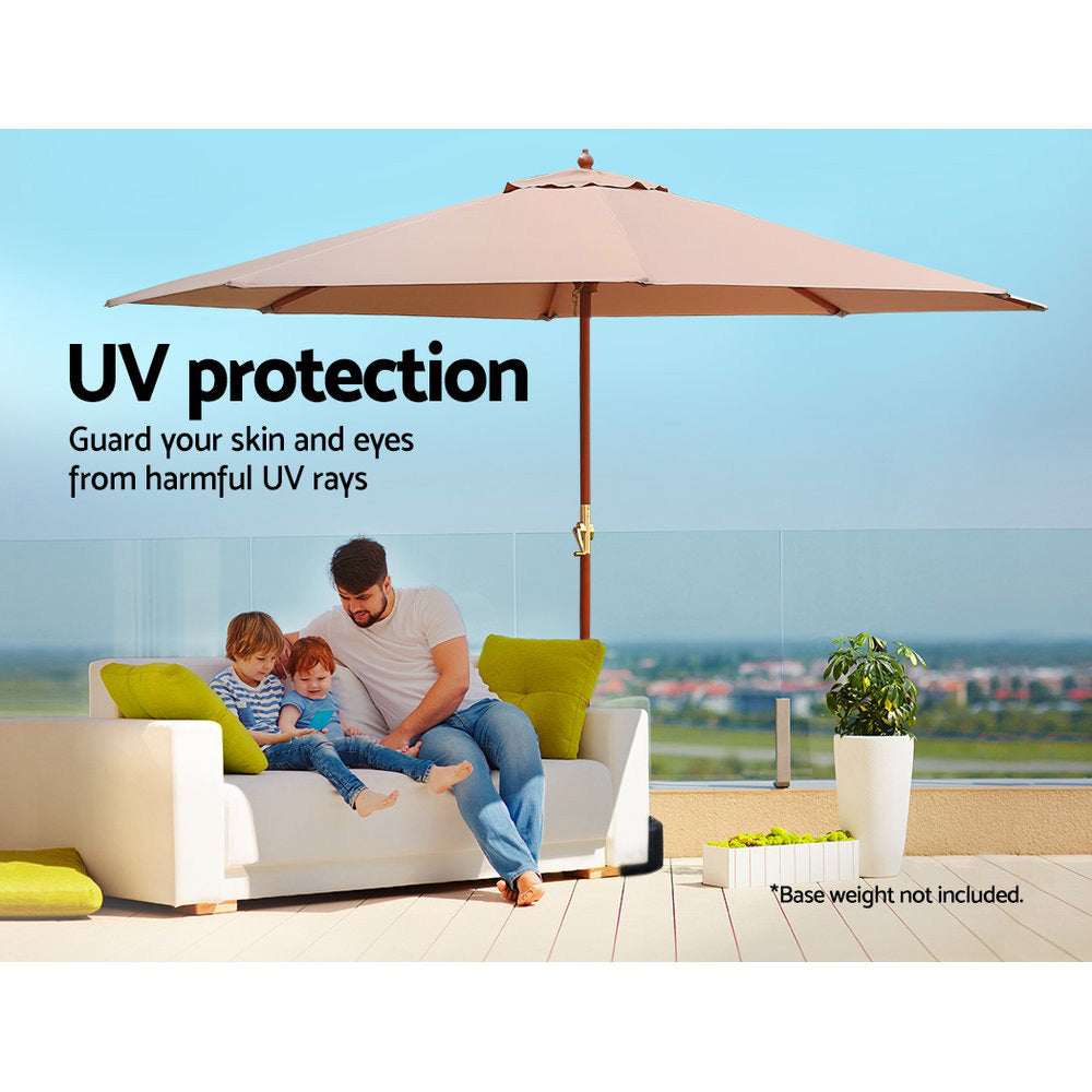 Beige outdoor umbrella with wooden pole and open umbrella canopy