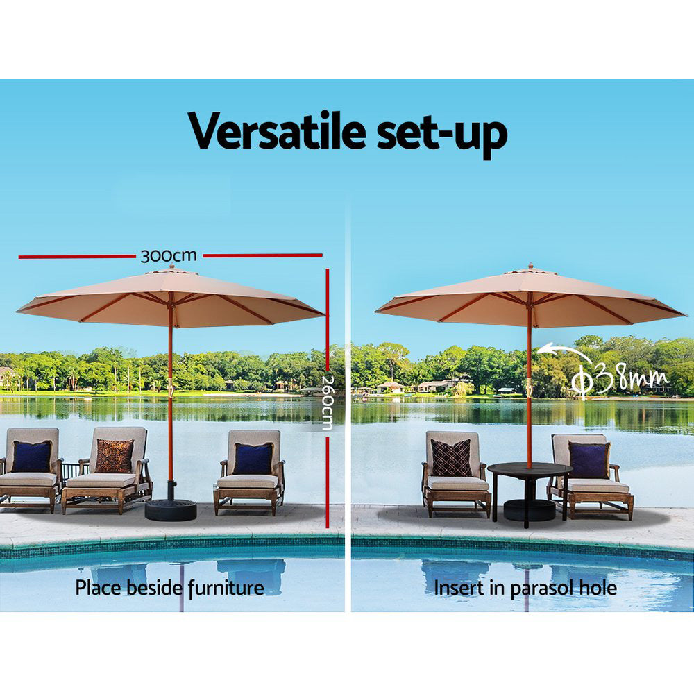 Beige patio umbrella with wooden pole and cross-brace frame