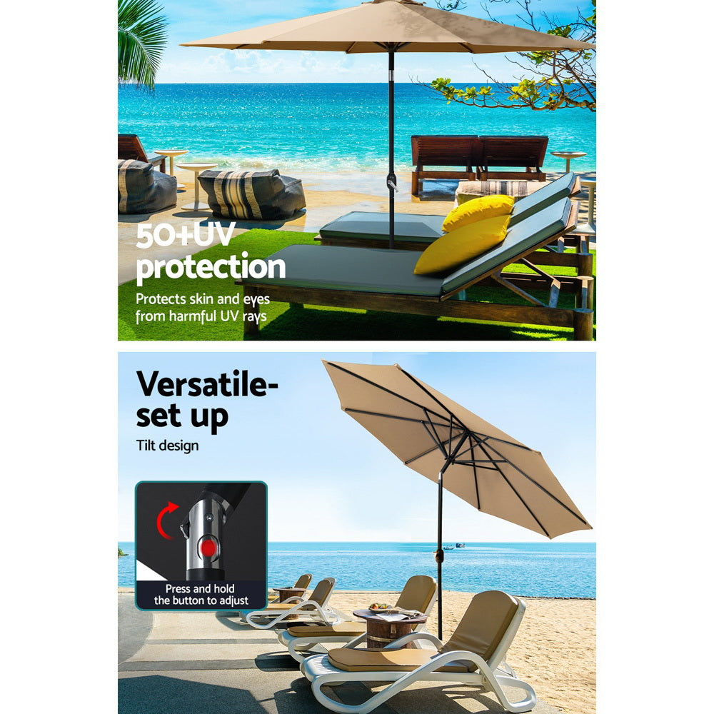 Beige outdoor umbrella above patio seating, black center pole