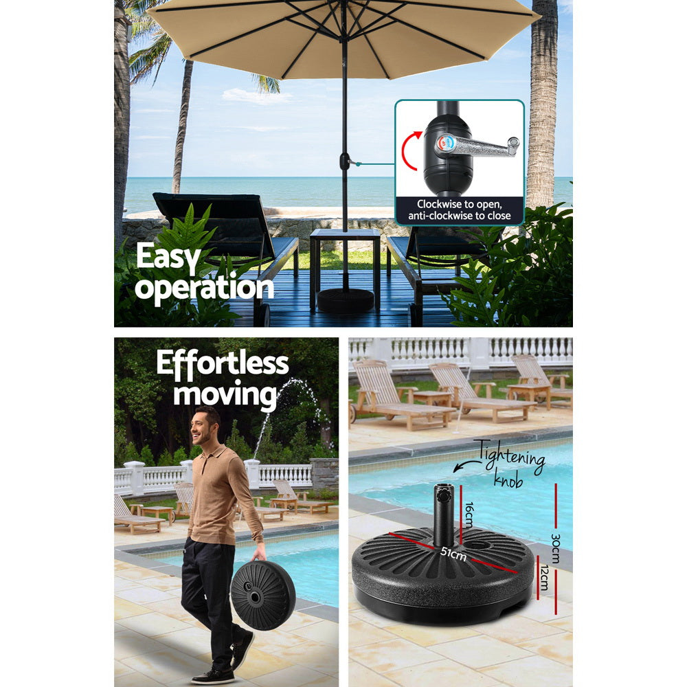 Beige tilting umbrella with black pole over patio set