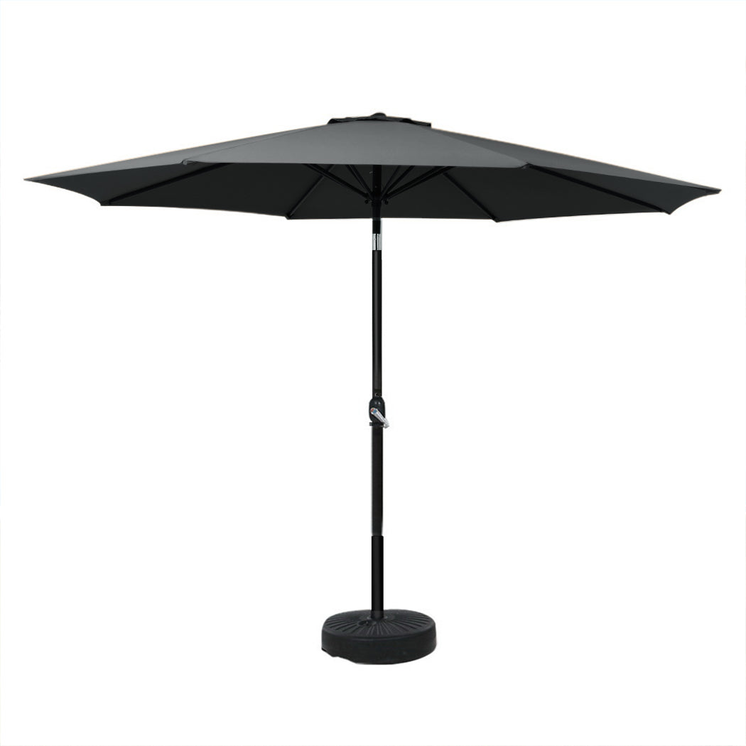 Black tilt outdoor umbrella with open canopy and central pole