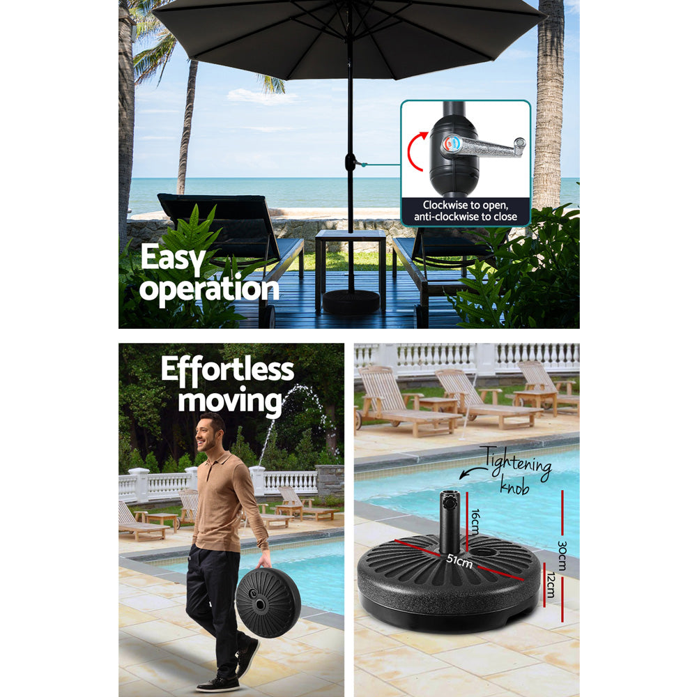 Black patio umbrella with open tilt canopy and central pole