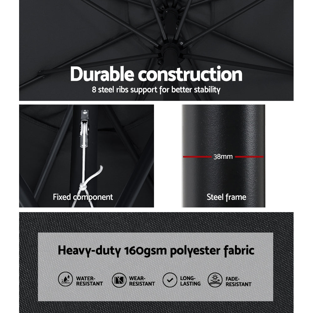 Black umbrella canopy with supporting ribs and steel frame