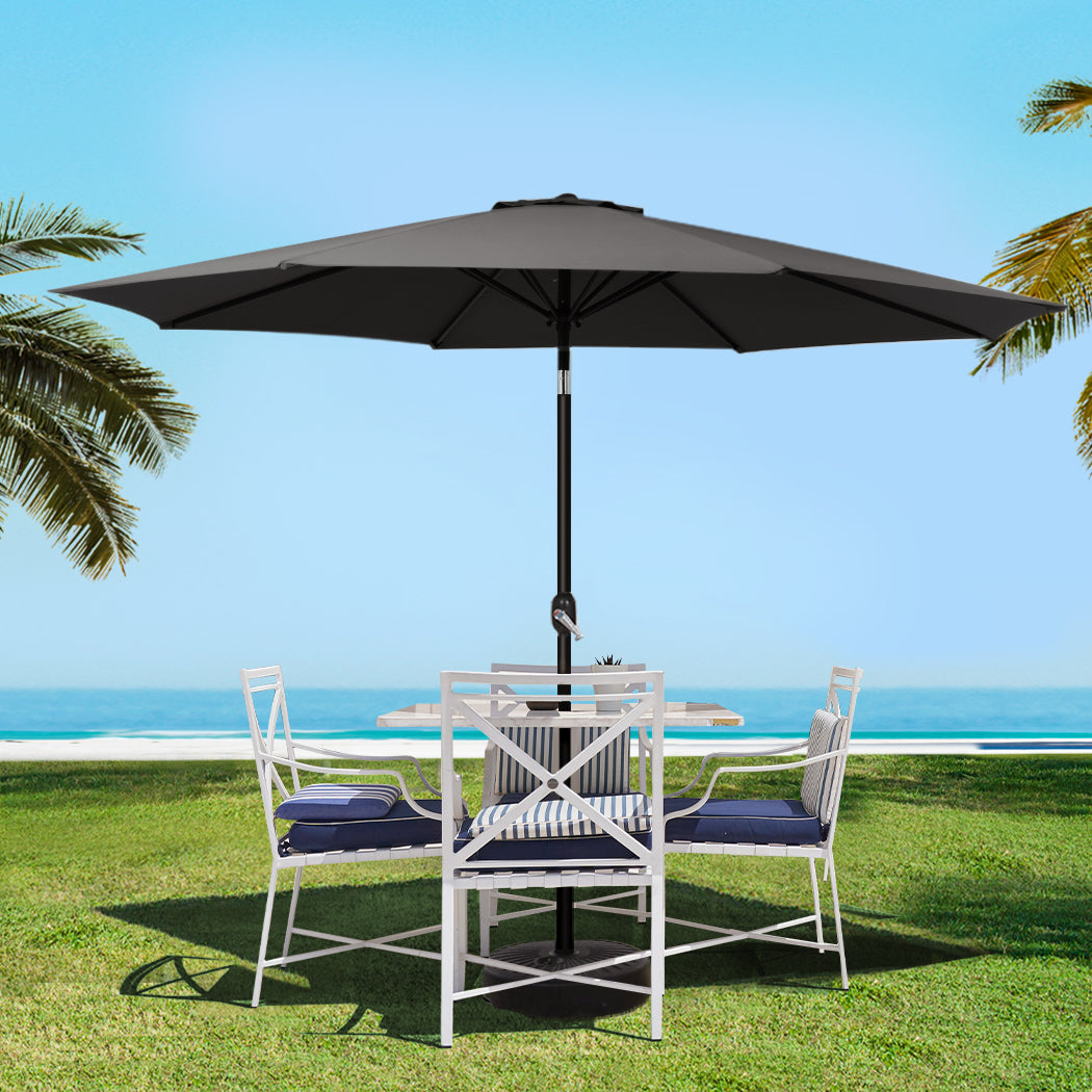 Black patio umbrella with open tilt canopy, central pole, and round base