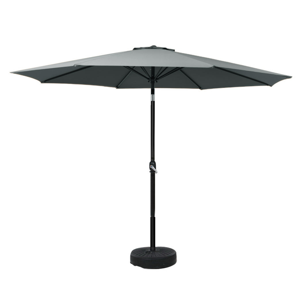 Charcoal tilt outdoor umbrella with dark canopy and center pole, round weighted base