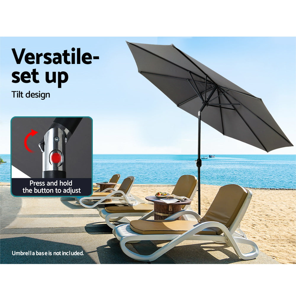 Charcoal outdoor patio umbrella with tilted canopy and central crank pole