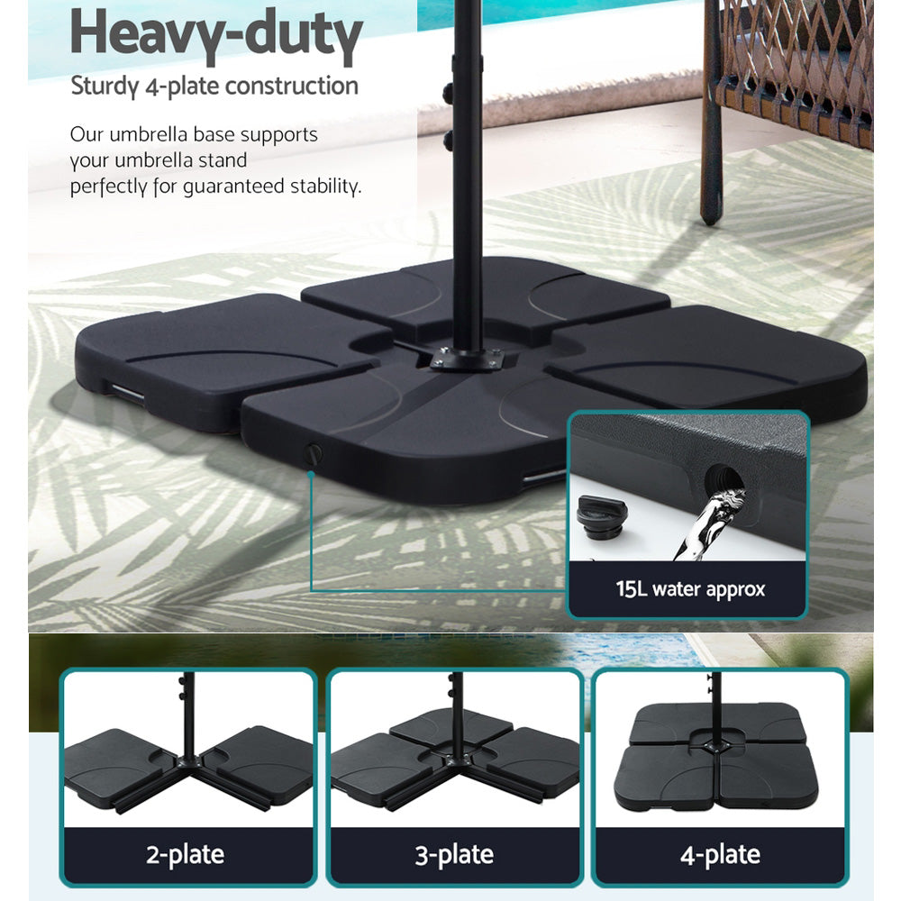 Black weighted umbrella base stand with four plates and center pole.