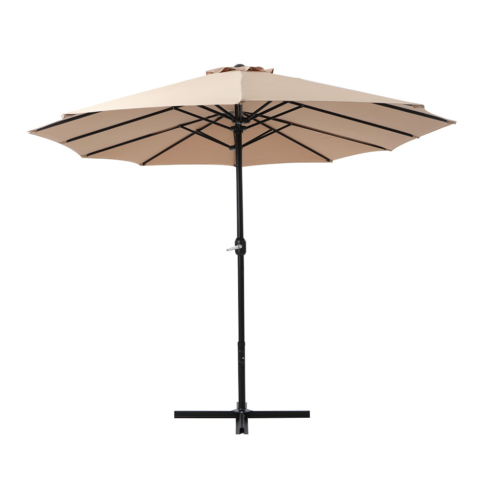 Beige patio umbrella canopy with black rib framework and center pole