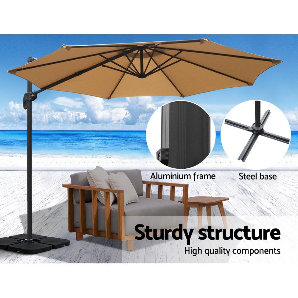 Beige cantilever umbrella with aluminum frame and steel base callouts