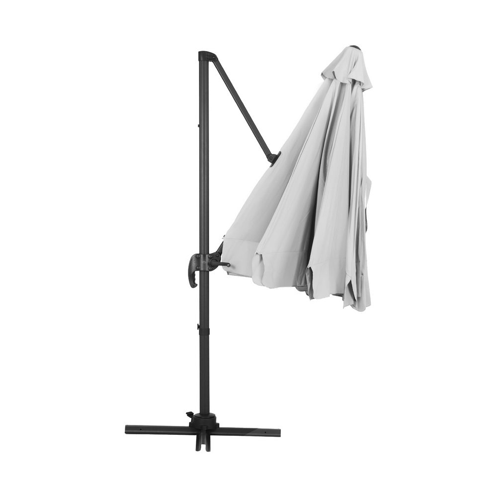3m cantilever patio umbrella with grey canopy fabric and dark vertical pole