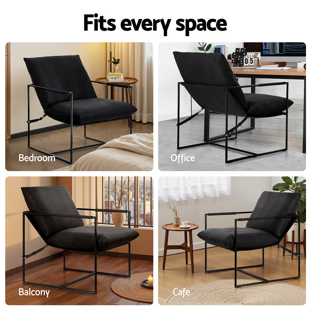 Black padded sling lounge chair with armrests on black metal frame